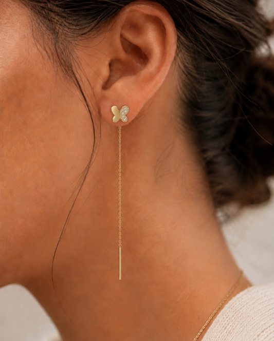 Butterfly 14K gold threader earrings by Serafino, detail view