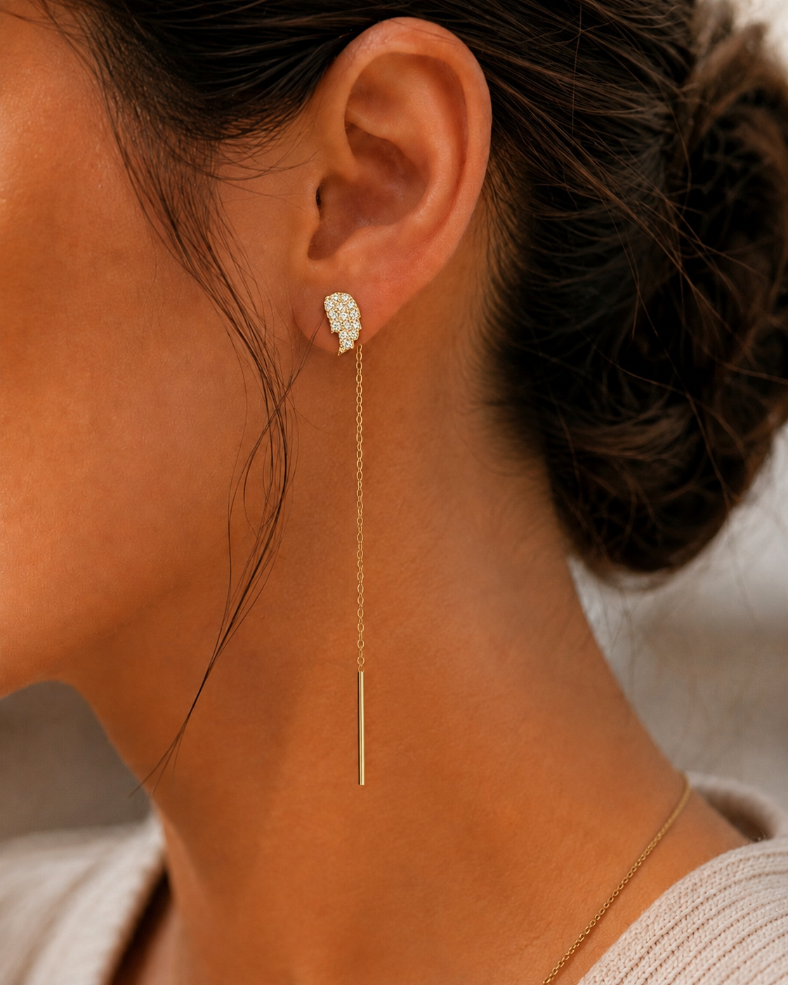 Angel Wings 14K gold threader earrings by Serafino, detail view