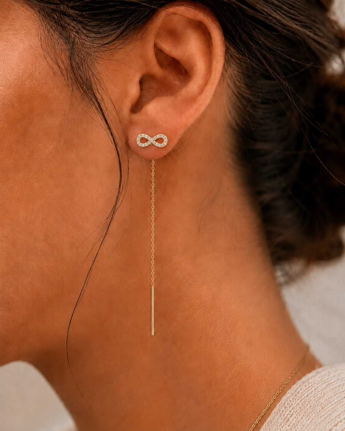 Infinity Love 14K gold threader earrings by Serafino, detail view